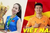 Hai tuyển thủ Lê Thanh Thúy và Đinh Quang Kiệt cầm cờ tại Lễ khai mạc ASIAD 20