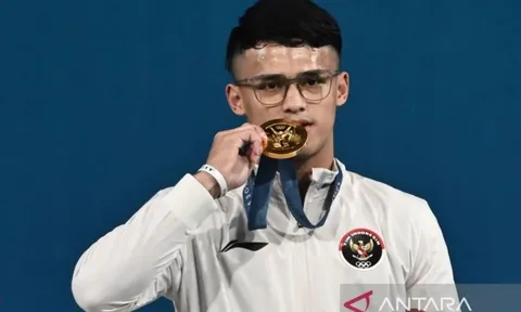 Vô địch cử tạ Olympic người Indonesia nhận thưởng là một công việc trong Chính phủ